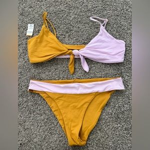 L Space bikini. Top is a large and bottoms are a medium. NWOT.